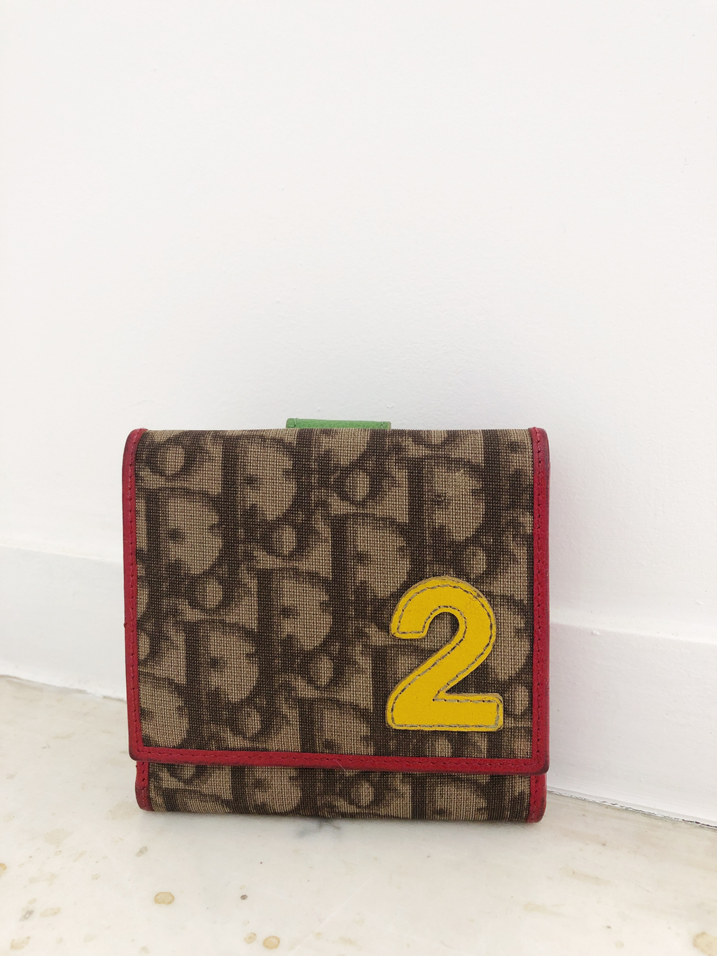Christian Dior par John Galliano — Portefeuille Rasta 2004
